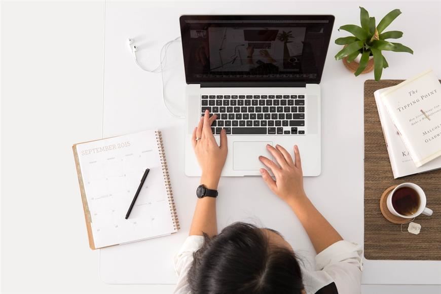  Girl on laptop at desk 
